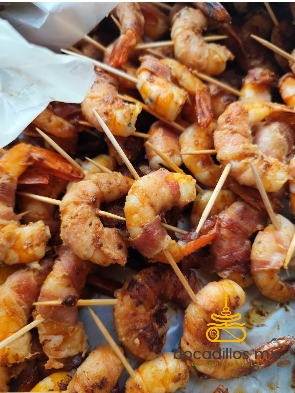 Camarones envueltos con tocino